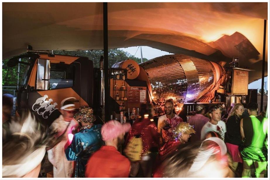 Monkey Shoulder cement mixer amid revellers