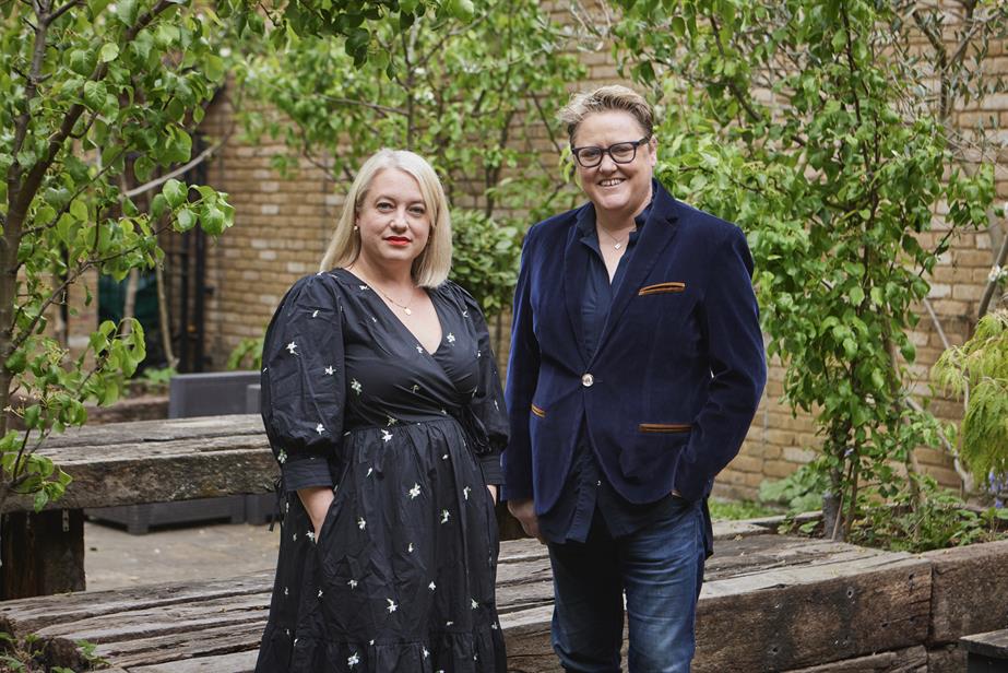 Linn Frost and Tamara Littleton standing side by side in a garden