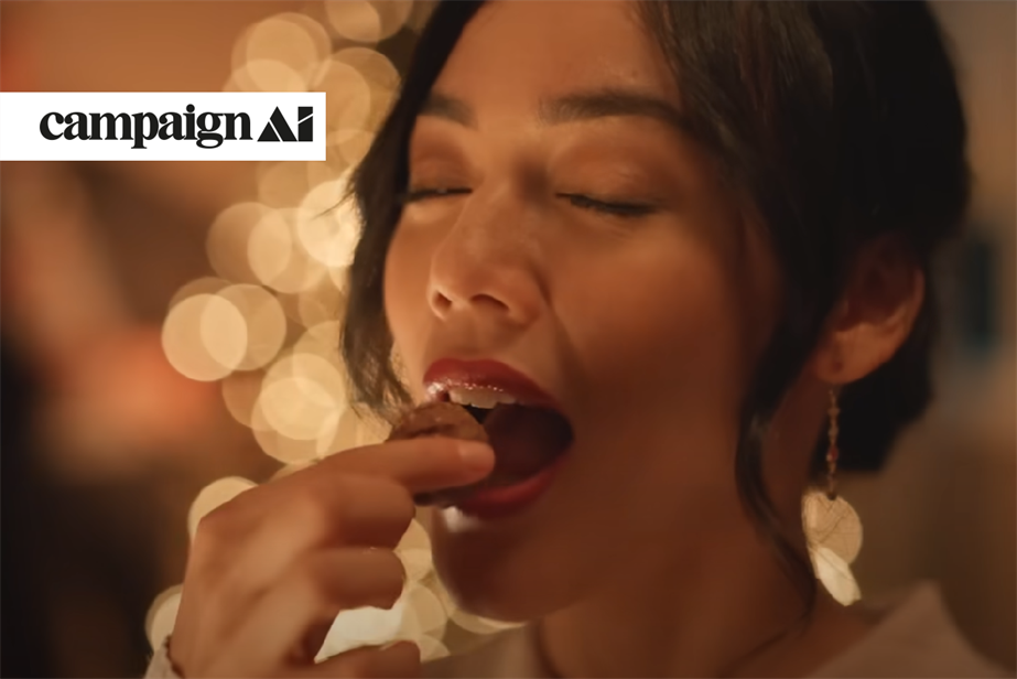 Woman eating a Ferrero chocolate